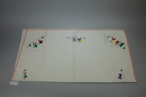 Image of Embroidered tablecloth with Inuit scenes (sparse)